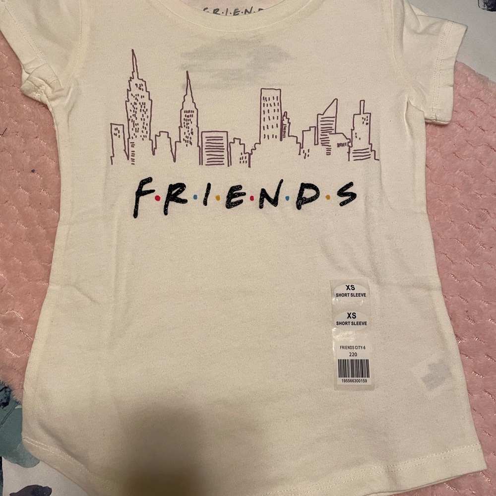 SOLD ❌New Girls XS & Med. “Friends" Cream T-Shirt